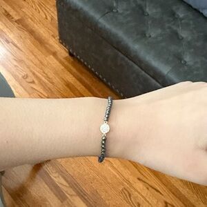 Elegant Black Beaded Bracelet with Gold Accents